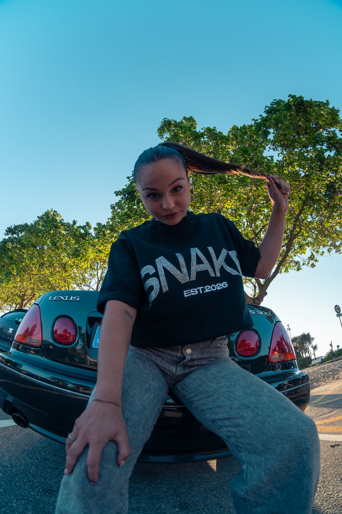 Comunidad SNAKE DEPT — cliente con ropa del drop, streetwear edición limitada